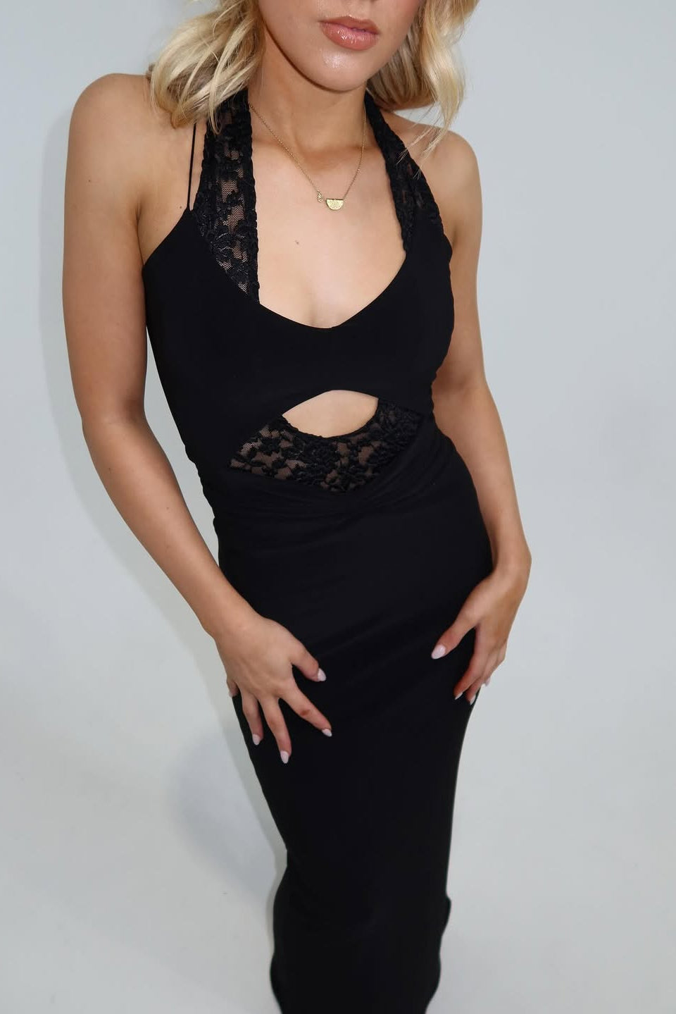 Black maxi dress with fitted corset bodice, underwire bust detail and elegant body contouring silhouette
