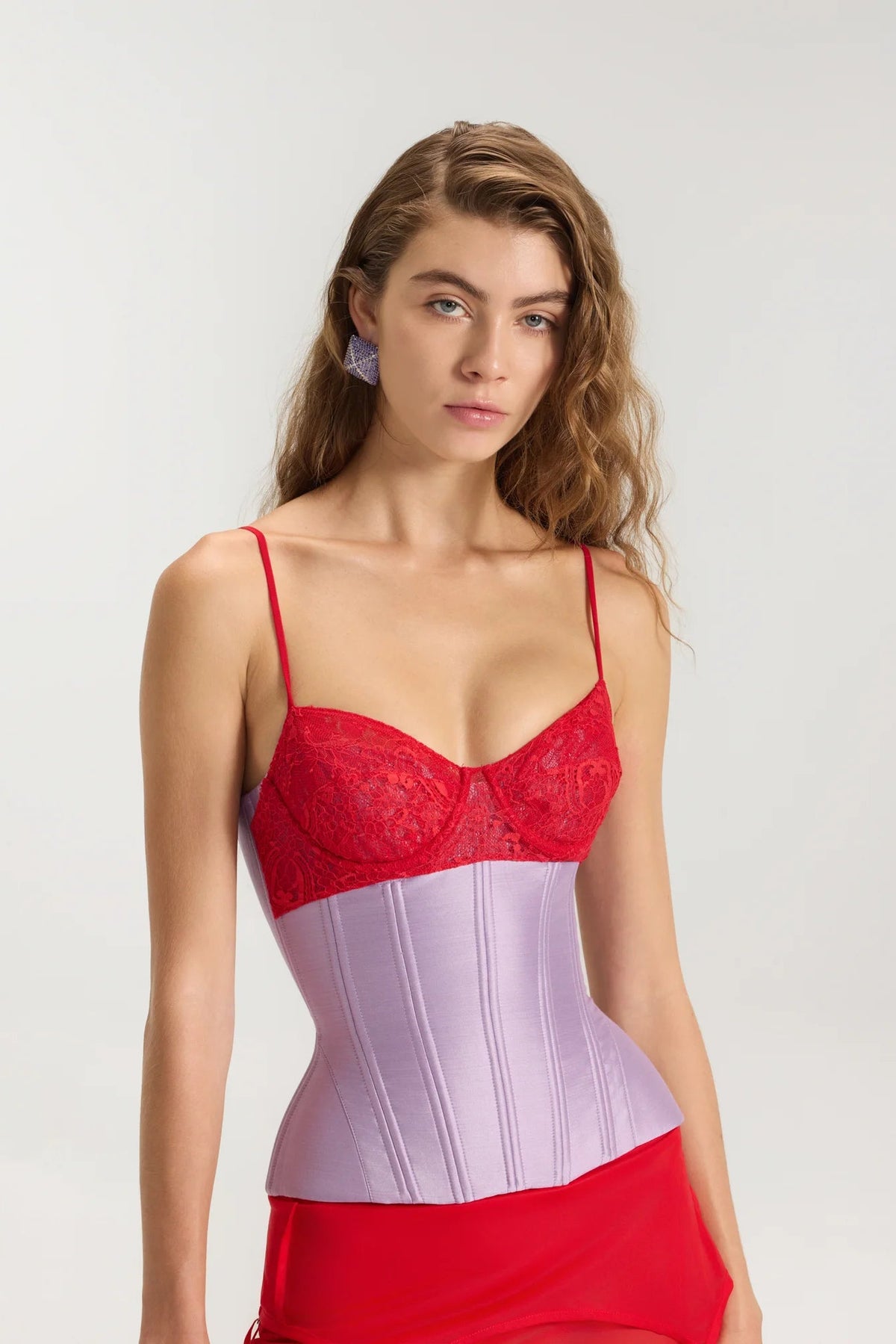 Fancì Club Uncladding Bustier Corset in Purple-Red styled with slip midi skirt, designer corset hire Adelaide Australia