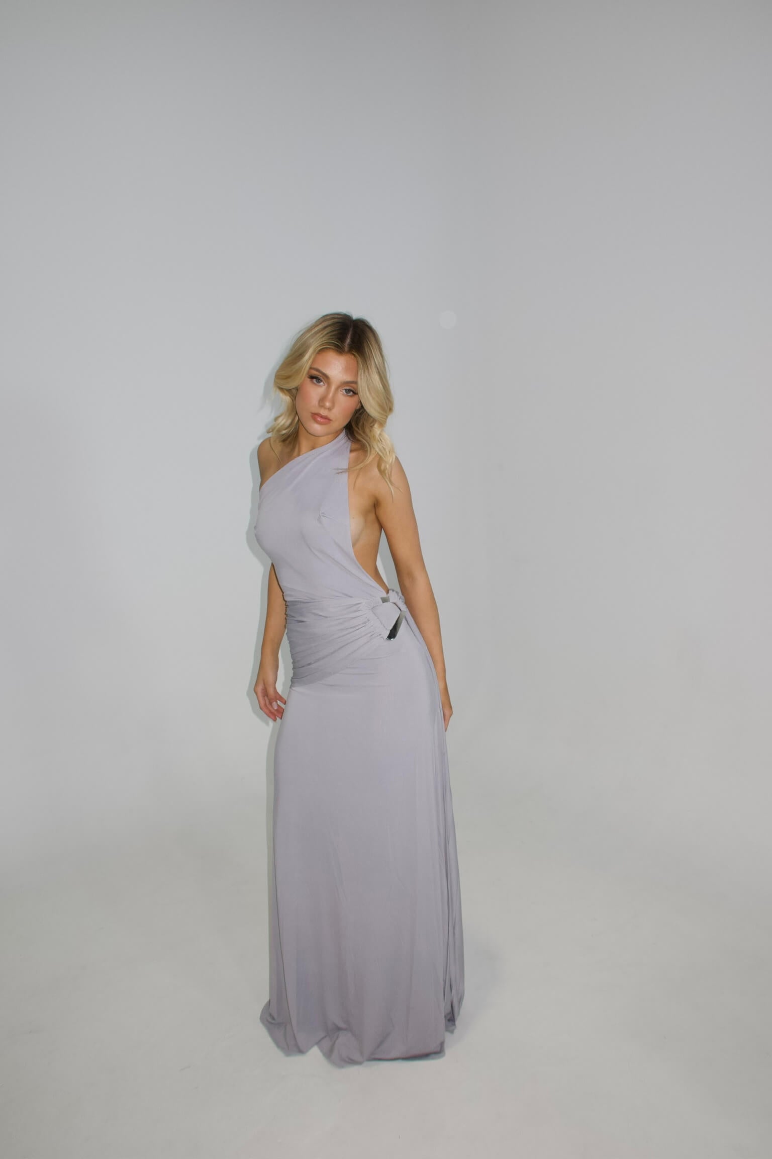 Ance Gria Gaia Gown in silver grey featuring an elegant full-length silhouette and refined evening design