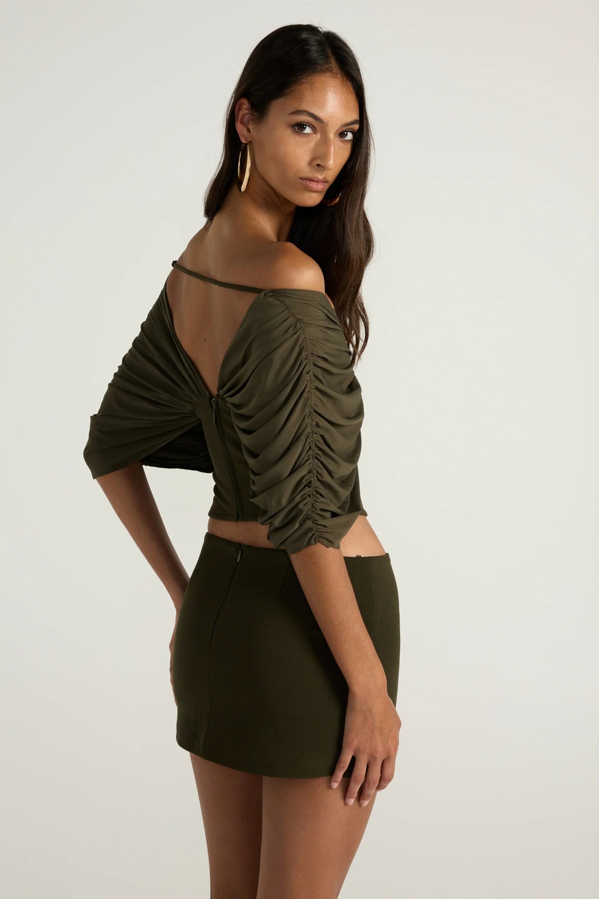 Ance Gria Neve Top in Olive worn off the shoulder with Neve Mini Skirt, designer co-ord hire Adelaide Australia