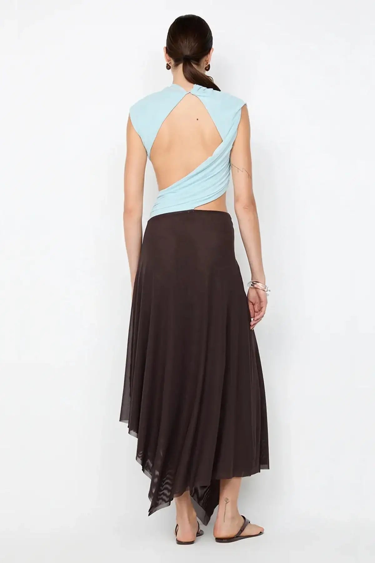 Back view of Bec & Bridge Conni Asym Midi Dress in blue and dark chocolate featuring sleek fitted stretch fabric, asymmetric one shoulder design and smooth body skimming midi silhouette