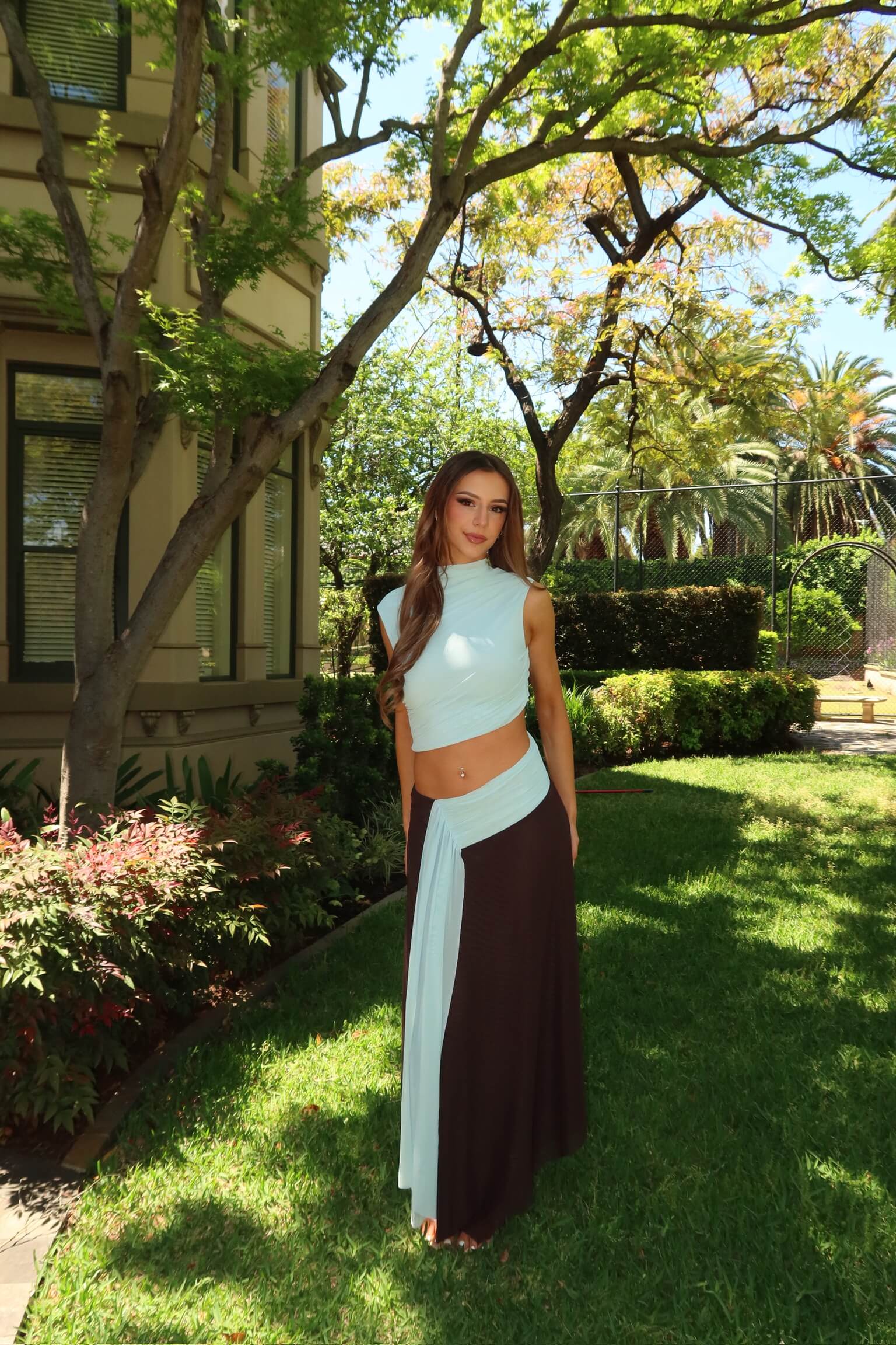 BEC + BRIDGE Conni Asym Midi Dress in blue and dark choc featuring an asymmetric neckline and flattering midi silhouette