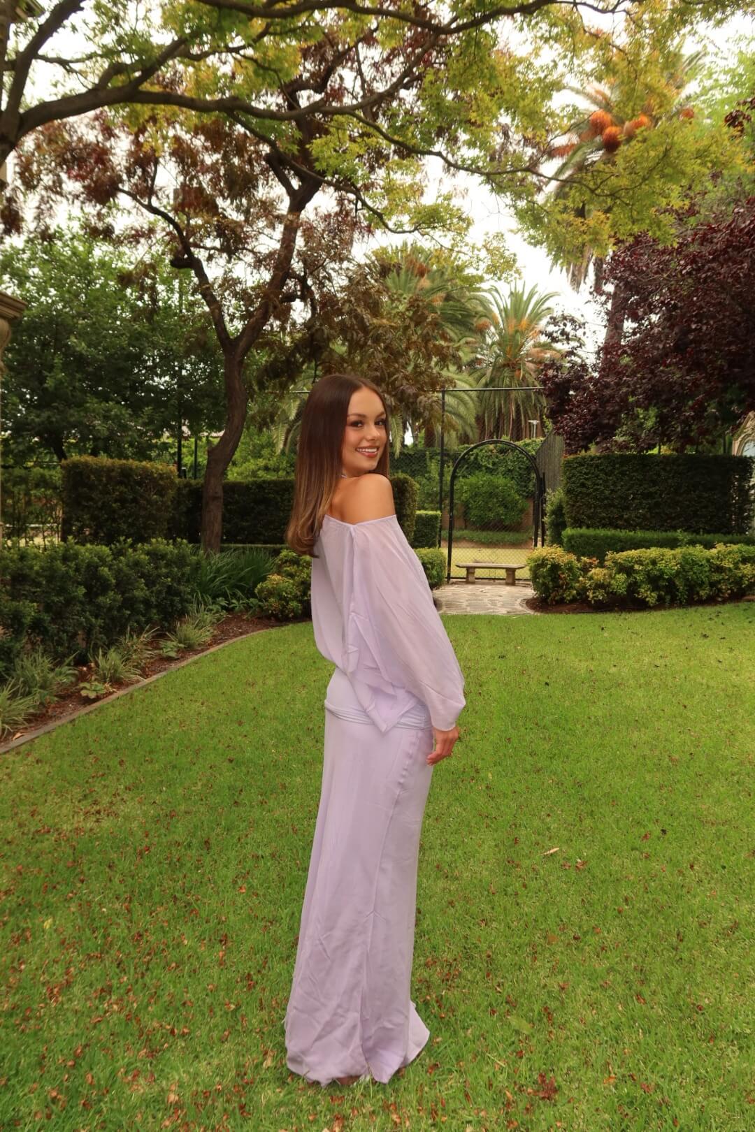 BEC + BRIDGE Delilah Overlay Maxi Dress in purple showcasing the elegant back design and flowing maxi silhouette