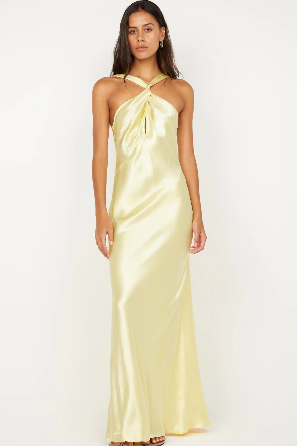 Bec & Bridge Elisia Twist Maxi Dress in ice yellow featuring a twist neckline, keyhole cut out and bias cut silhouette