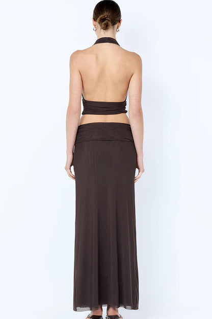 Back view of Bec & Bridge Eva Drape Set in brown showing open back halter top design and smooth fitted skirt finish