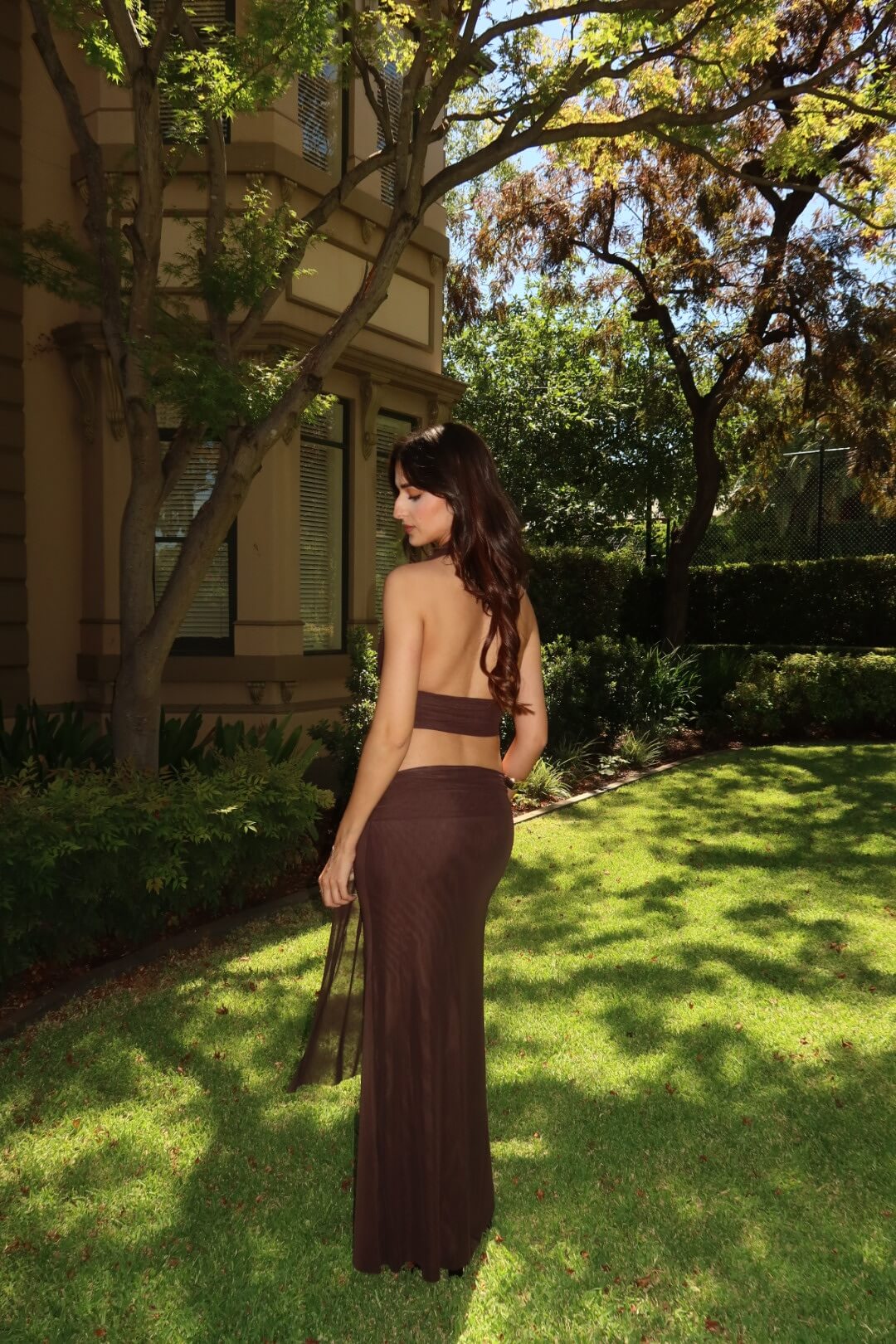 BEC + BRIDGE Eva Drape Set in dark chocolate showcasing the elegant back design and coordinated two-piece silhouette