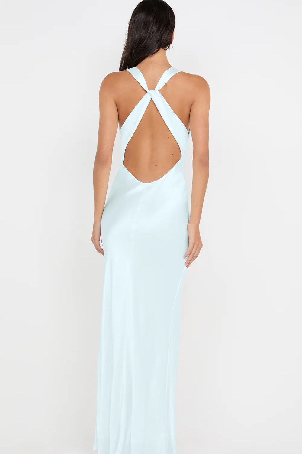 Back view of arctic blue maxi dress featuring halter tie closure and open back design with smooth flowing silhouette