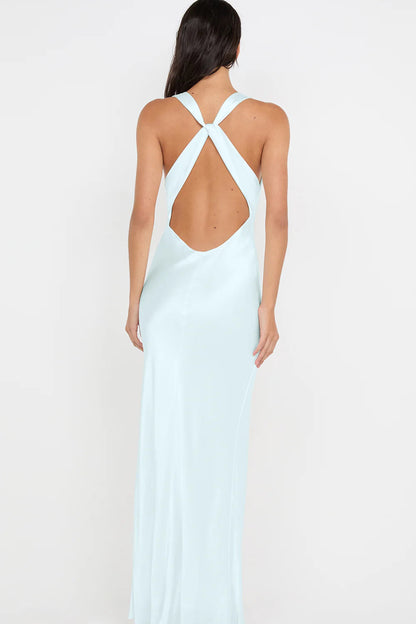 Back view of arctic blue maxi dress featuring halter tie closure and open back design with smooth flowing silhouette