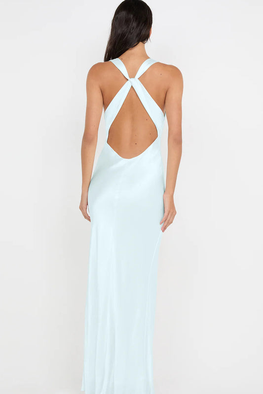 Back view of arctic blue maxi dress featuring halter tie closure and open back design with smooth flowing silhouette