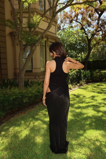 Camila Coelho Estrella Maxi Dress in black showcasing the elegant back design and flowing maxi silhouette