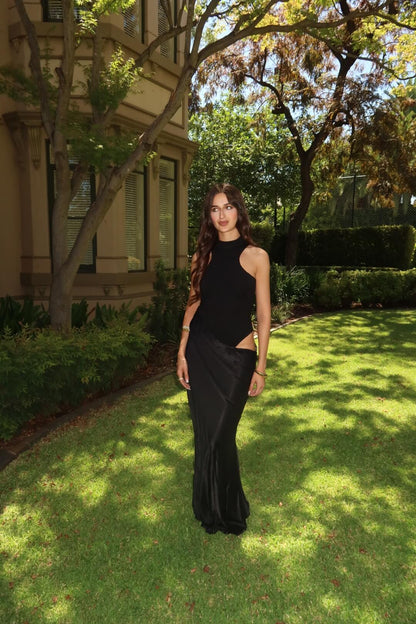 Camila Coelho Estrella Maxi Dress in black featuring an elegant full-length silhouette and timeless evening design