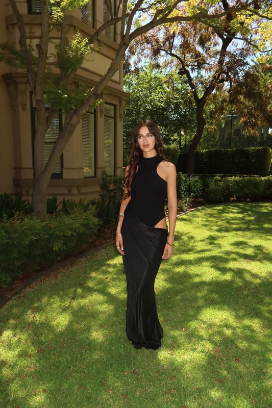 Camila Coelho Estrella Maxi Dress in black featuring an elegant full-length silhouette and timeless evening design