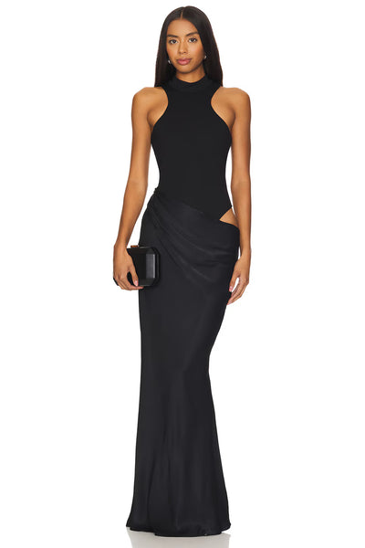 Camila Coelho Estrella Maxi Dress in black featuring asymmetric neckline, fitted bodice and elegant floor length gown silhouette