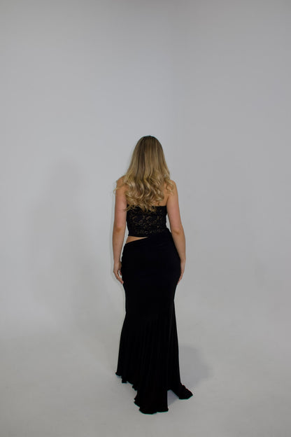 Deconduarte Ilona Maxi Dress in black showcasing the elegant back design and flowing maxi silhouette