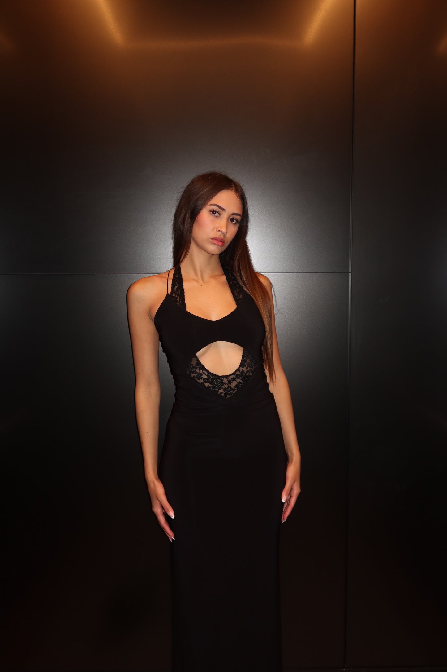 Close-up of the Deconduarte Mia Vita Maxi Dress in black highlighting the bodice, neckline and premium fabric detail