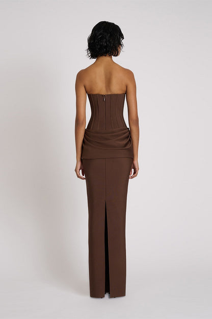 Back view of Eliya The Label Hilda Gown in chocolate showing structured corset fit and smooth elegant finish with floor length silhouette