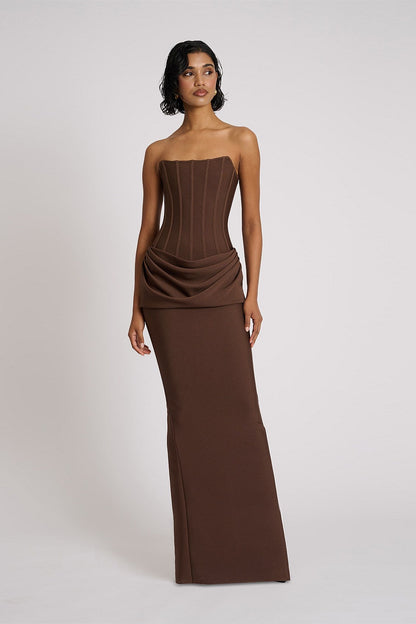 Close up of structured corset bodice on chocolate Eliya The Label gown showing boning detail and sculpted fit
