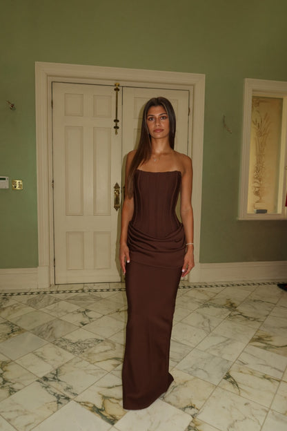 Three-quarter front view of the Eliya The Label Hilda Gown in chocolate showcasing the flattering fitted silhouette