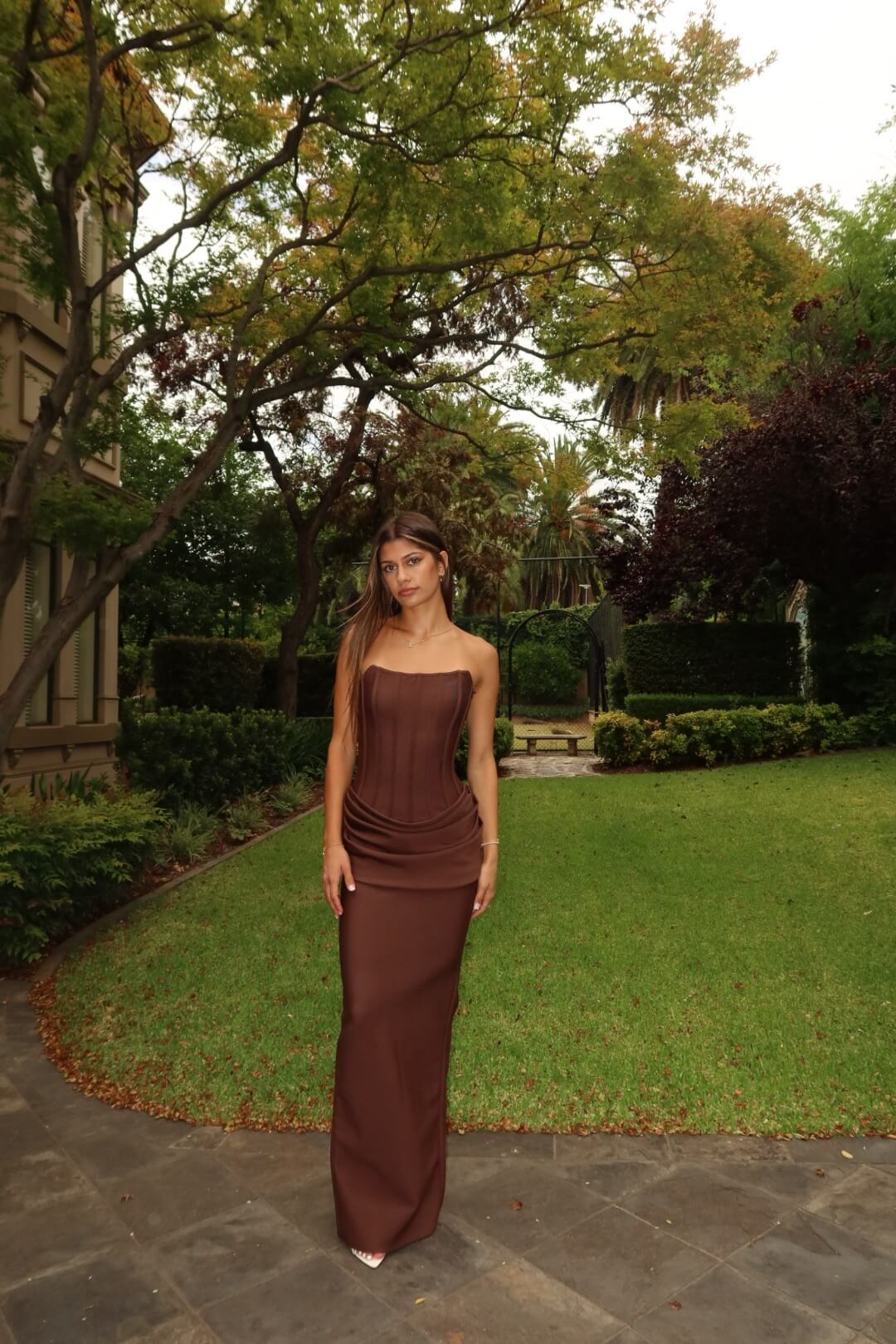 Eliya The Label Hilda Gown in chocolate featuring a sophisticated full-length silhouette and elegant evening design