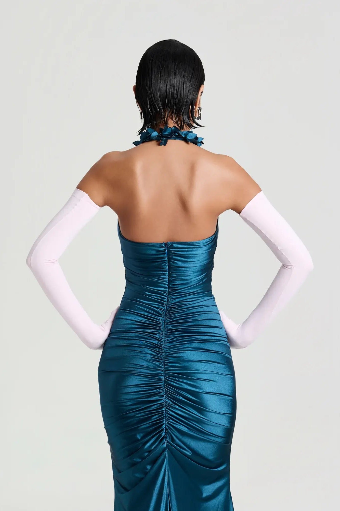 Gianni floral halter dress in steel blue shown from the back for designer dress hire in Adelaide, melbourne , darwin 