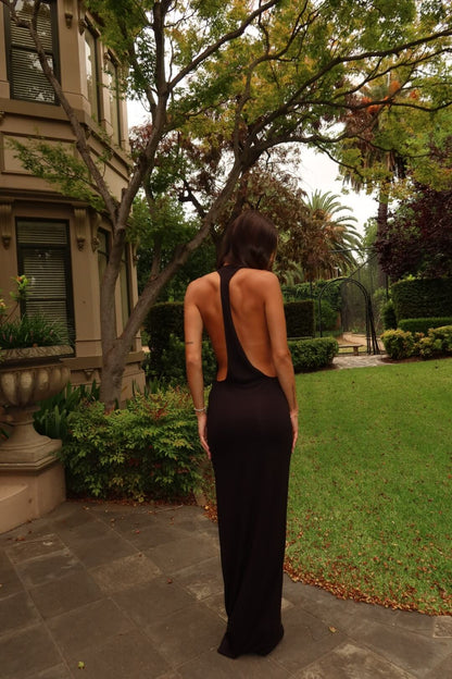 Henne Ophelia Tank Dress in black highlighting the elegant back design and full-length silhouette