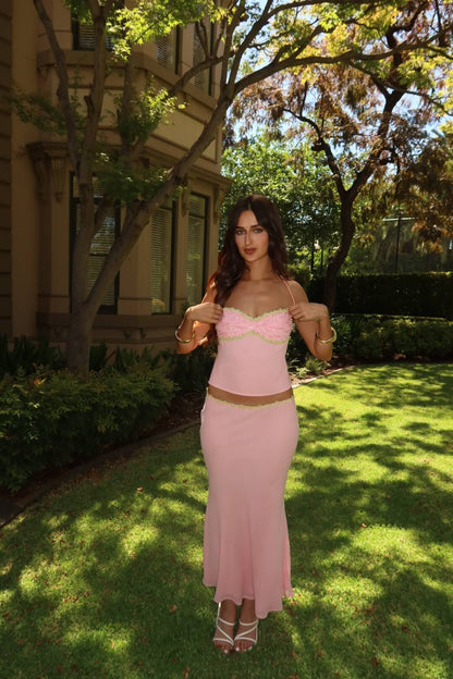I Am Delilah Jemima Set in baby pink featuring a matching crop top and maxi skirt with an elegant silhouette