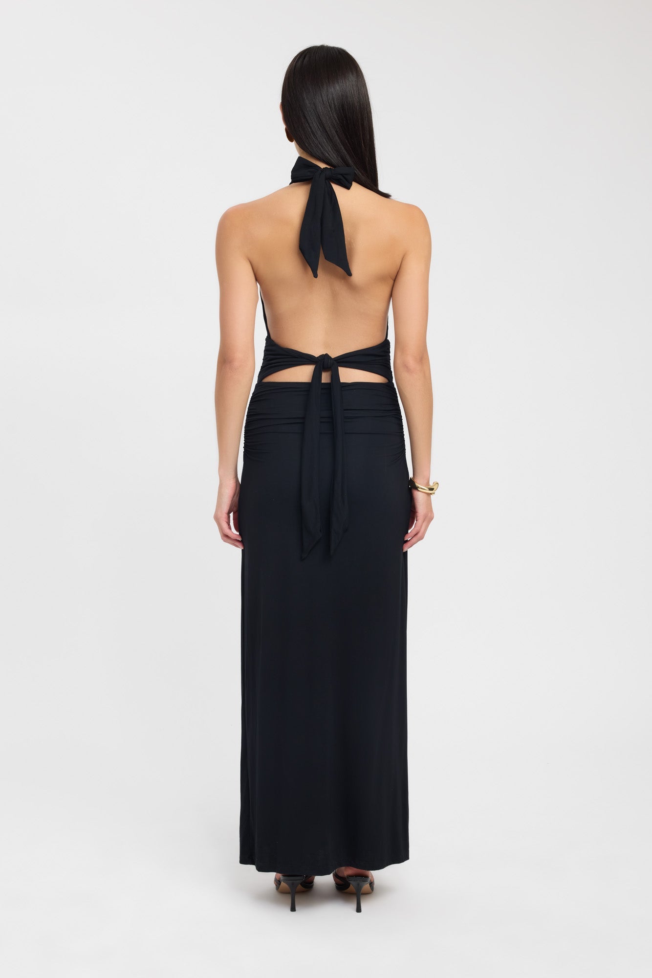 Back view of Kookai Leni Maxi Dress in black showing open back design and adjustable tie detail