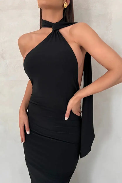 Close up of high neckline and fitted bodice on Melani The Label Leoni Dress in black showing smooth double layered stretch fabric