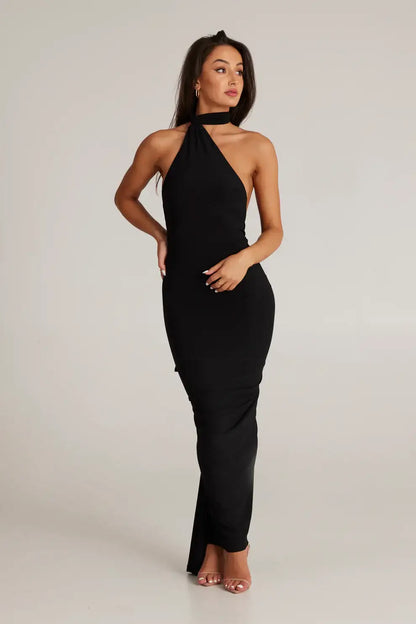 Melani The Label Leoni Dress in black featuring high neckline, long sleeves and elegant floor length fitted silhouette
