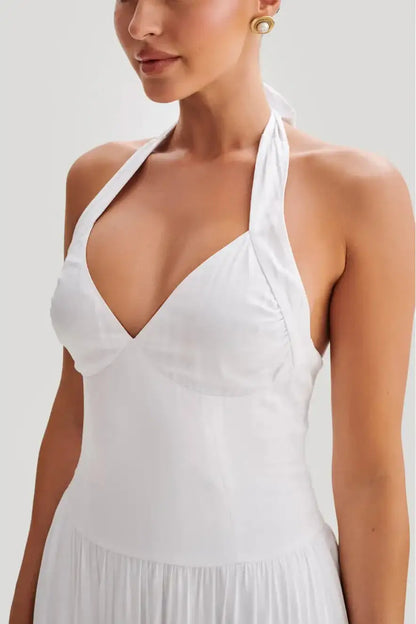 Close up of halter neckline and fitted bodice on Meshki Harriette Midi Dress in white with soft draped fabric and structured waist