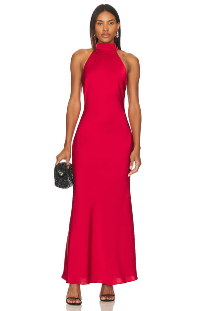 Misha x Revolve Evianna Gown in crimson red featuring high neckline, sleeveless fitted column silhouette and elegant floor length satin finish