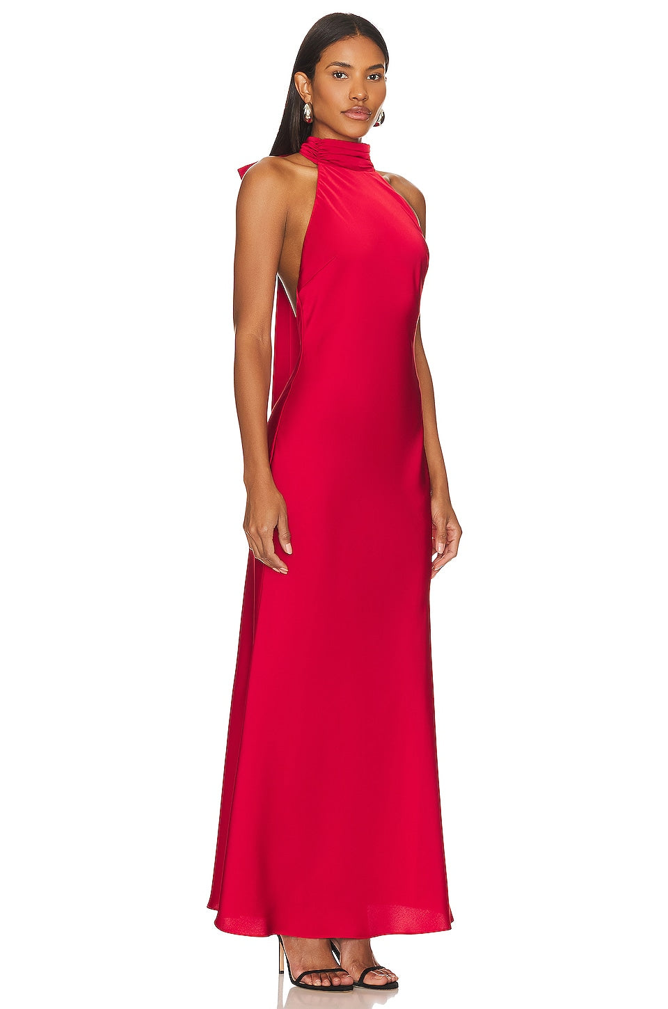 Misha x Revolve Evianna Gown in crimson red featuring high neckline, fitted column shape and elegant floor length satin silhouette for formal occasions