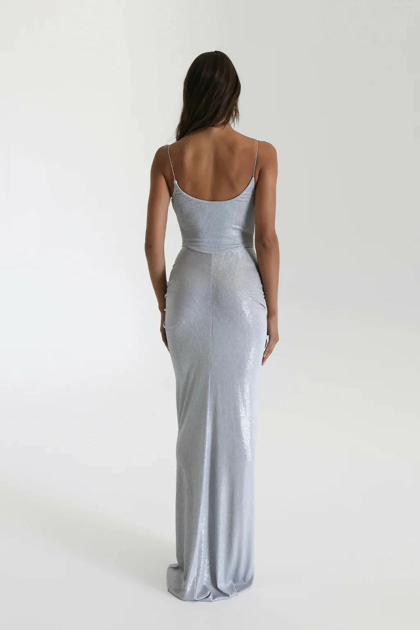 Back view of Natalie Rolt Allora Gown in silver showing fitted silhouette and smooth metallic finish with clean seam detailing
