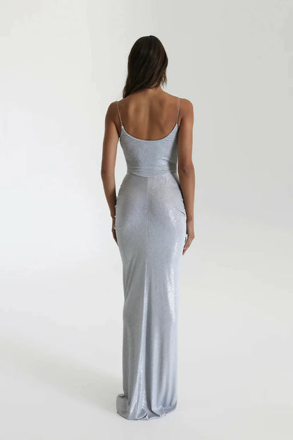 Back view of Natalie Rolt Allora Gown in silver showing fitted silhouette and smooth metallic finish with clean seam detailing