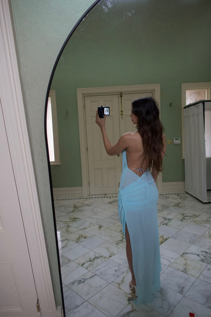 Natalie Rolt Anastasia Maxi Dress in baby blue showcasing the open back design and flowing maxi silhouette