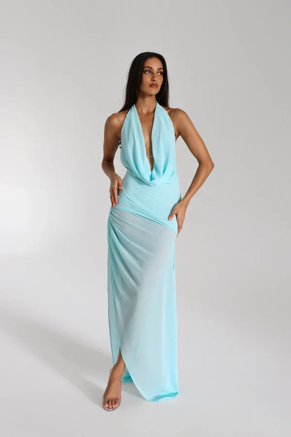 Natalie Rolt Anastasia Maxi Dress in baby blue featuring halter neckline, soft draped georgette fabric and flowing convertible mini to maxi silhouette with elegant open back design
