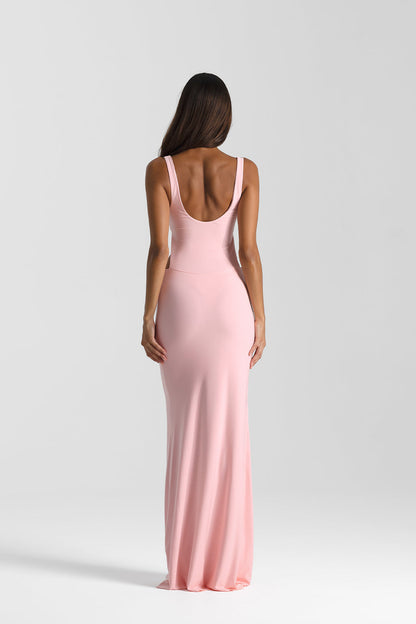 Back view of Natalie Rolt Inez Dress in pink showcasing open back detail, adjustable ties and sleek fitted silhouette
