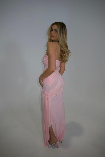 Back and side view of the Natalie Rolt Miranda Gown in blossom pink showcasing the elegant silhouette and flowing skirt