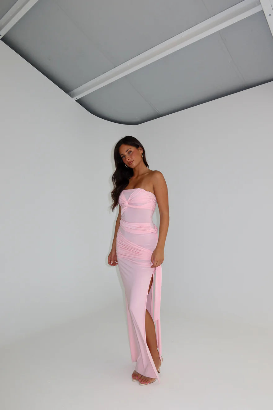 Natalie Rolt Miranda Gown in blossom pink featuring strapless neckline, sculpted bodice and elegant floor length silhouette with soft draped jersey fabric