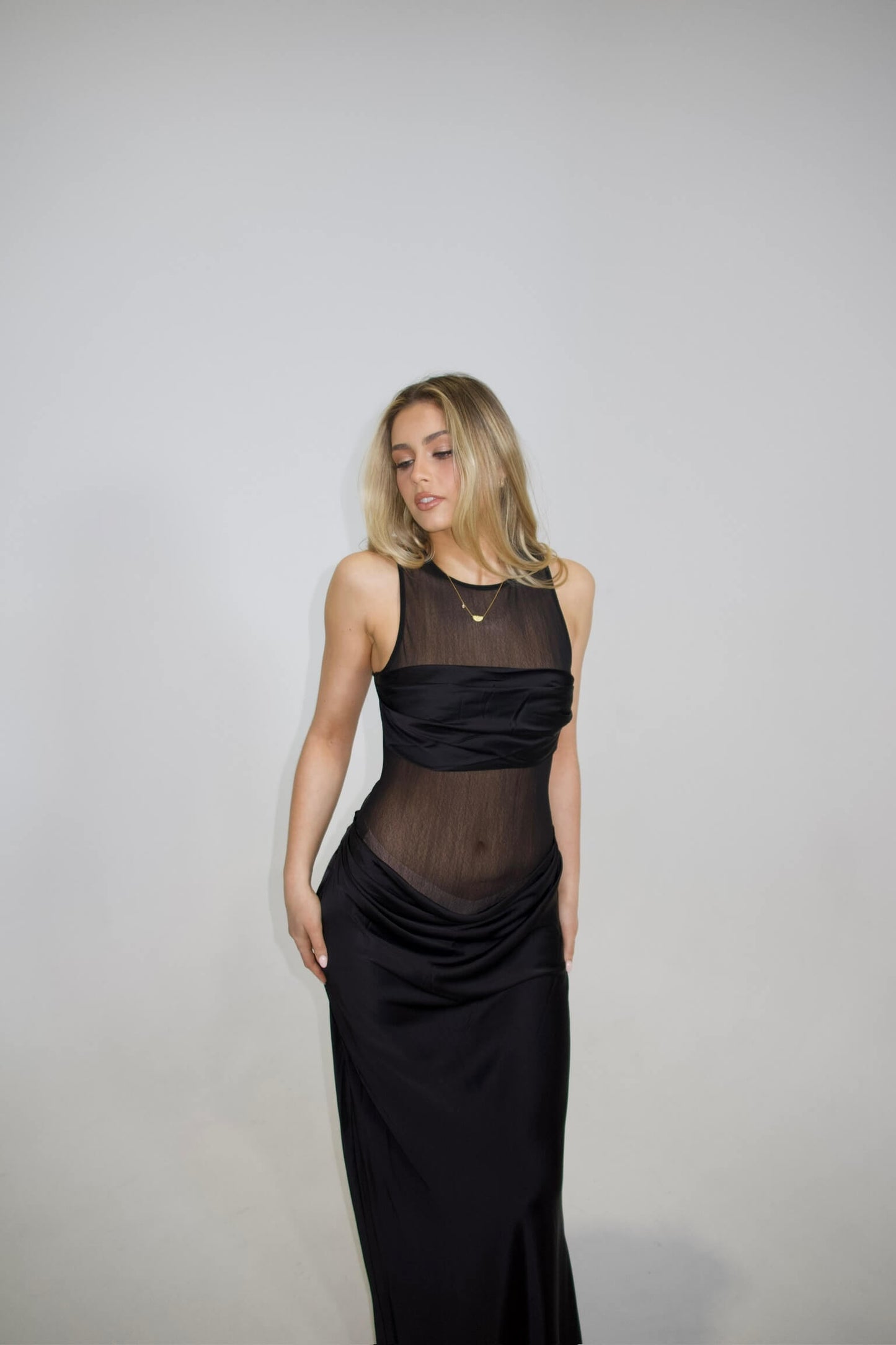 NBD Fiza Maxi Dress in black with strapless neckline and sculpted fitted silhouette