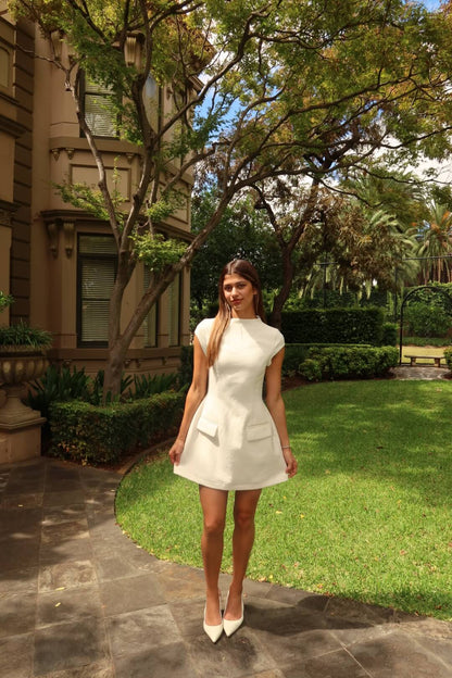 Odd Muse Ultimate Muse Cap Sleeve Mini Dress in white featuring a structured mini silhouette and elegant cap sleeves