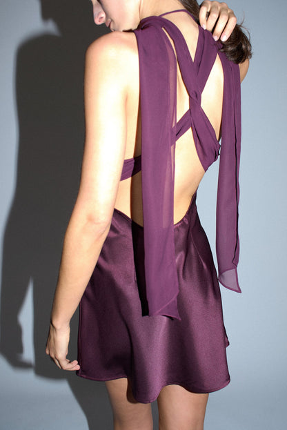 Plum brown mini dress back detail highlighting the sleek fitted design and sophisticated evening wear styling