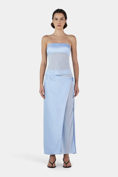 Close up of Patrice strapless top in baby blue featuring fitted bust panel and sheer body detailing