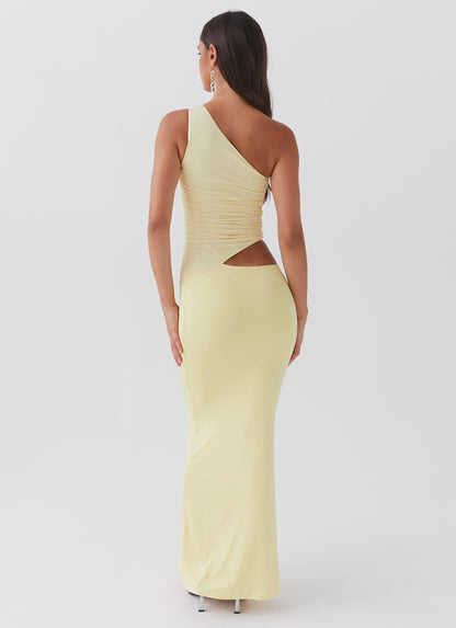 Back view of yellow maxi dress showing fitted silhouette and asymmetric one shoulder strap design