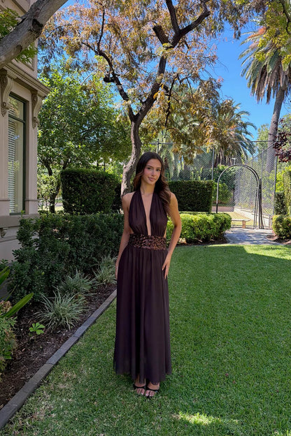 Far shot of the Saboa Studios Alessandra Maxi Dress in brown highlighting the neckline, bodice and premium fabric detail