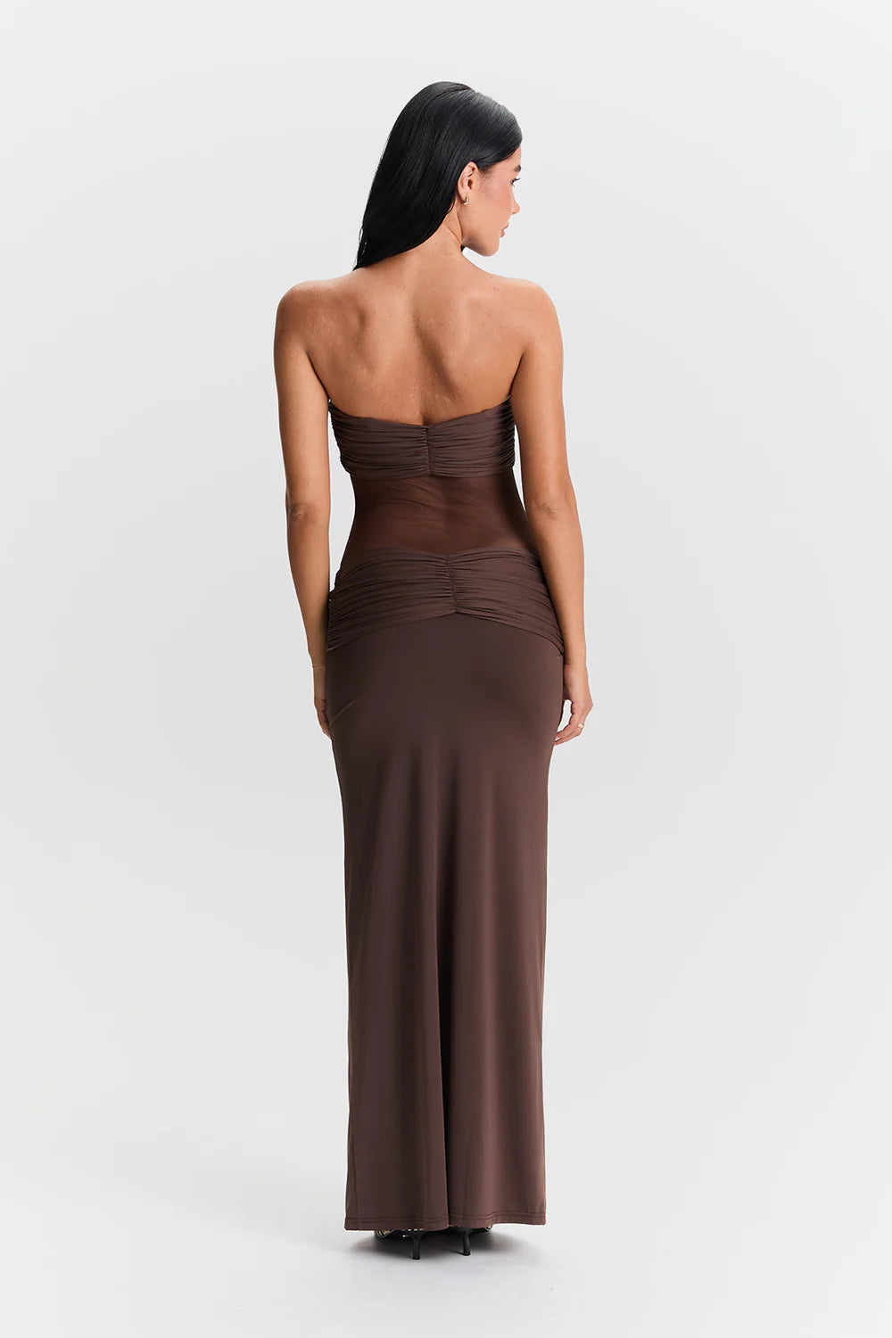 Back view of Sasha Therese Amara Maxi Dress in brown featuring open back design and halter tie closure