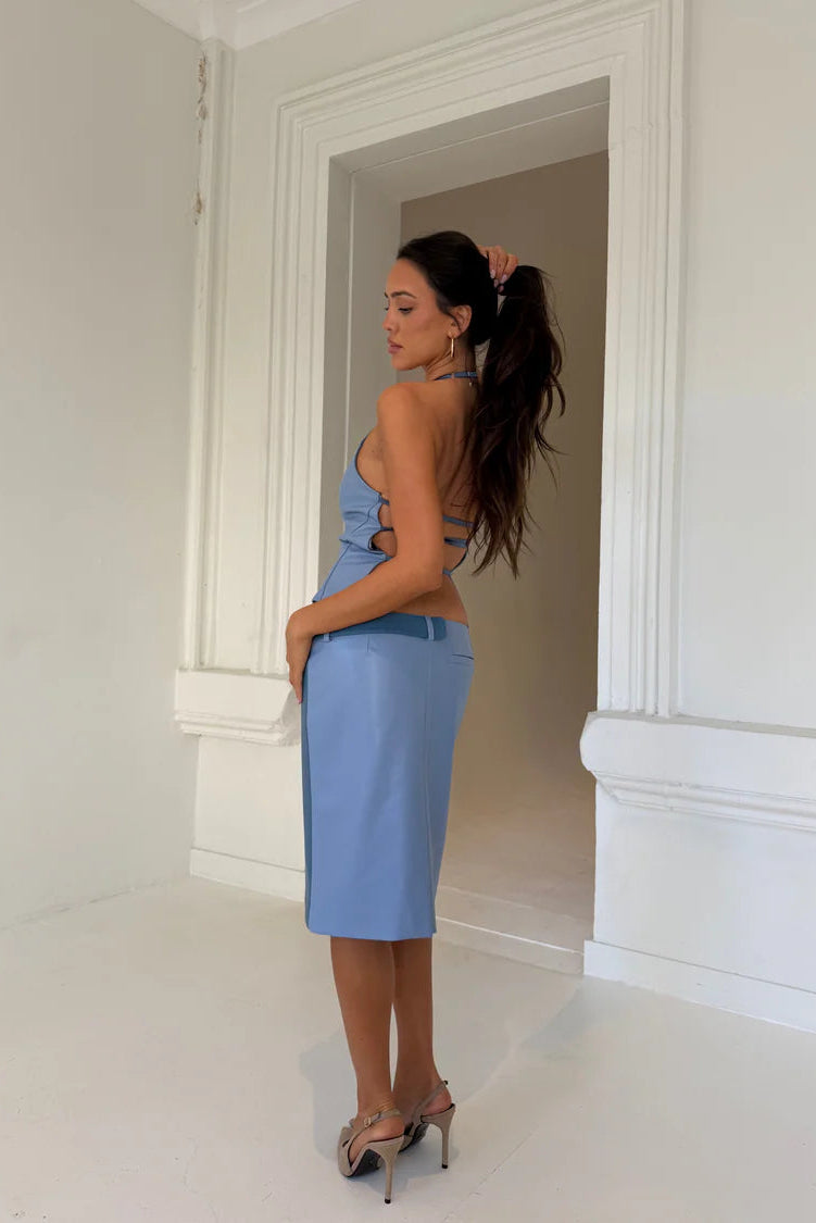 Close up of the back on the Setaye Azure Midi Set in blue showing textured fabric and clean tailored finish