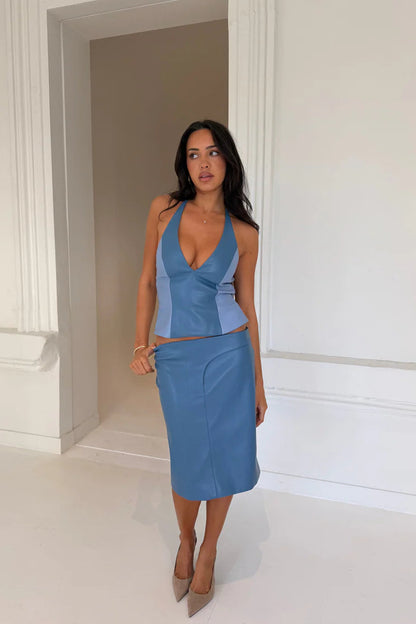 Setaye Azure Midi Set in blue featuring a fitted crop top, matching high waisted midi skirt and elegant body skimming silhouette with textured fabric