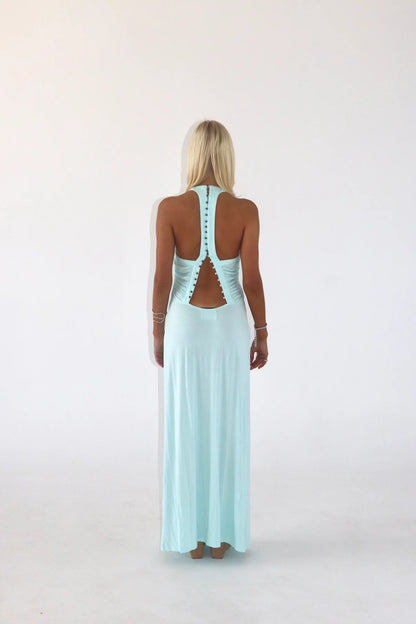 Sola Musa Angelina maxi dress back view in aqua showing racer back design with brushed brass button closure and fitted silhouette