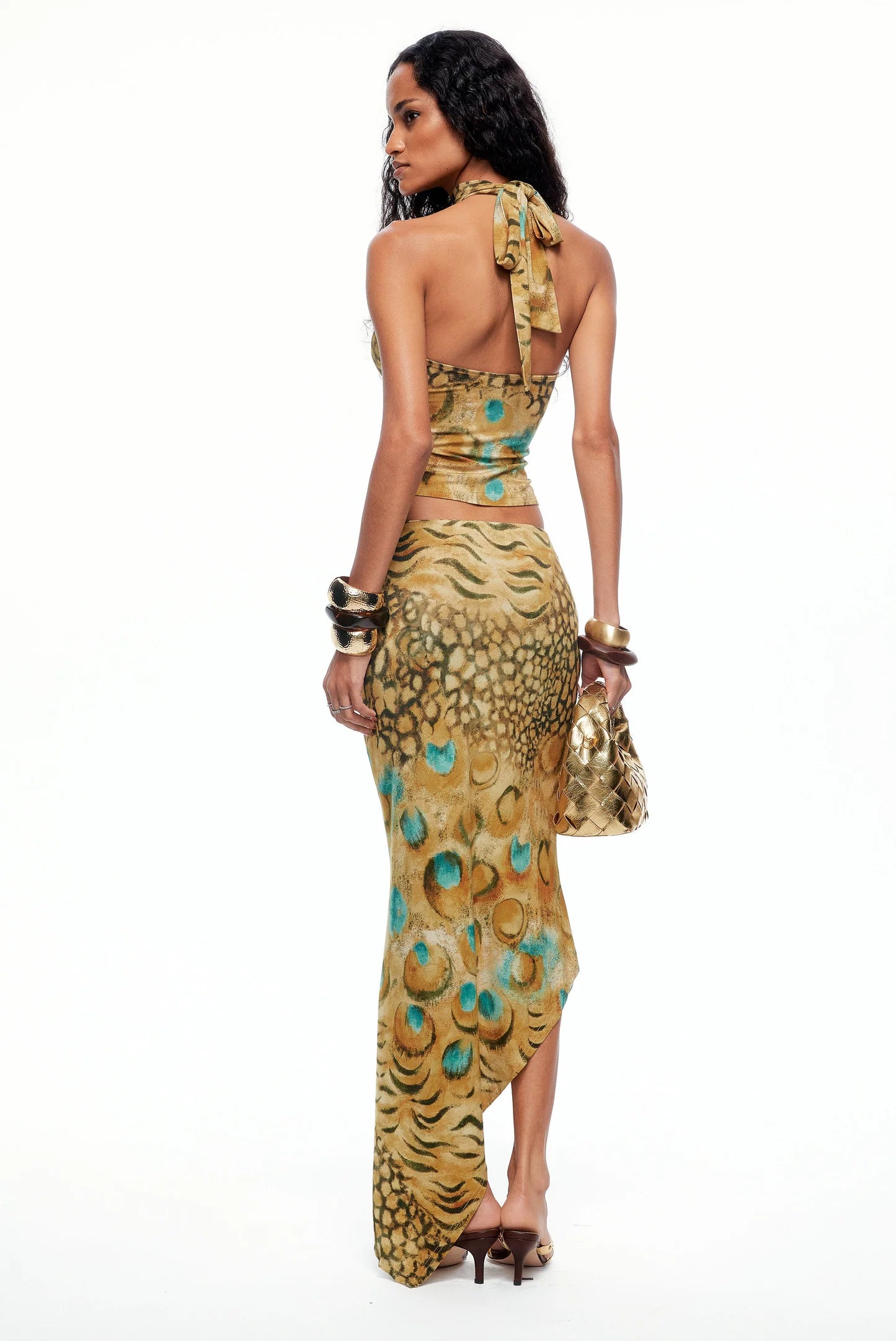 Back view of THE KRIPT Soline Skirt with low-waist fitted design
